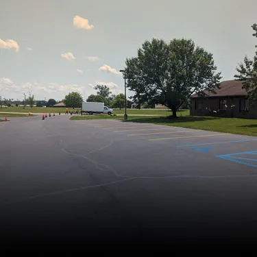 Pothole and crack repair on an asphalt surface