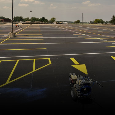Crisp parking lot line striping and ADA marking